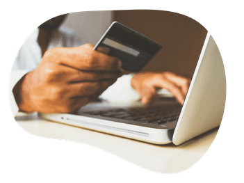 Image of man paying with credit card